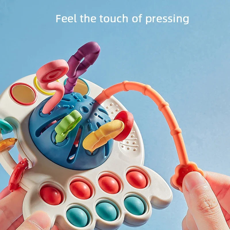 Jouet Bébé Sensoriel Multicolore – Tirage de Cordes & Motricité (6–36 mois)